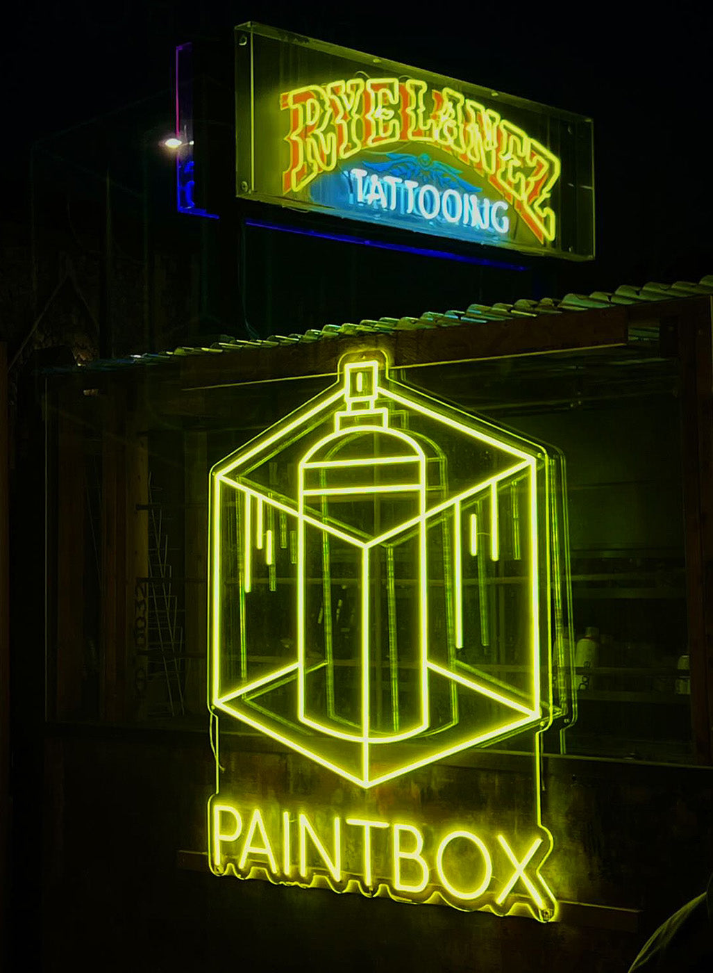 paintbox neon sign in yellow